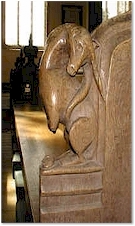 A unicorn on a bench end - All Saints, Thornham